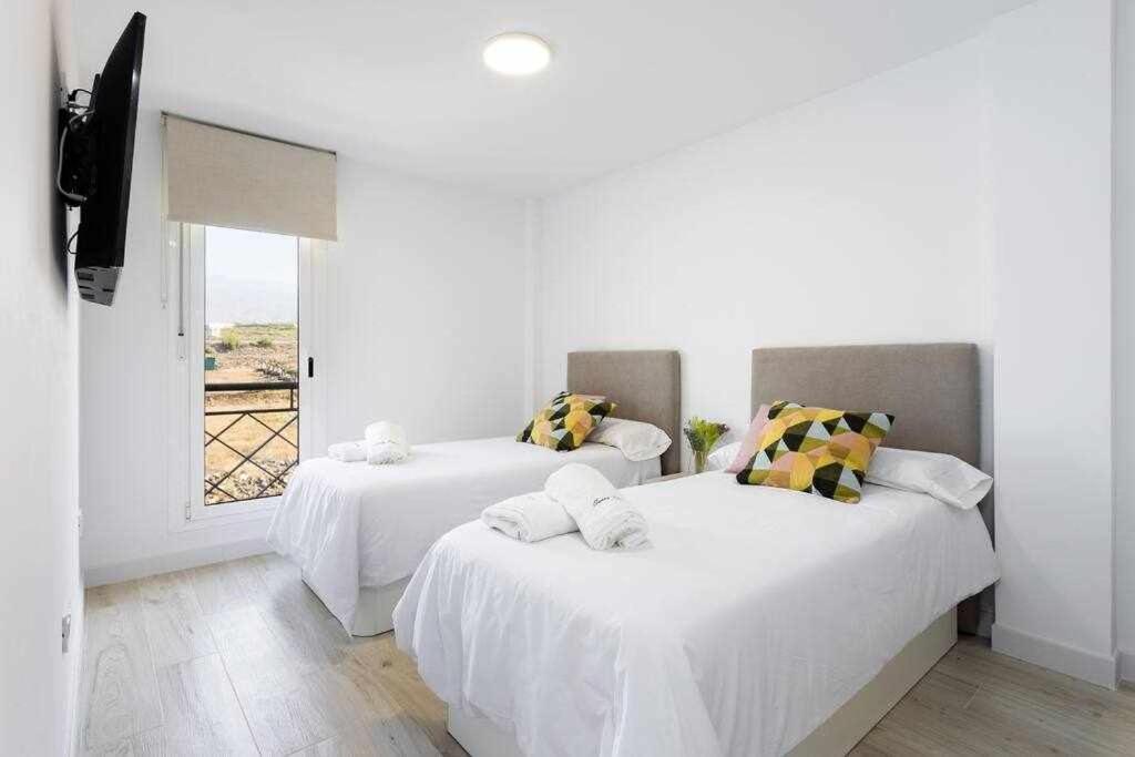 Sunnyland Apartment Arona Cho Esterno foto