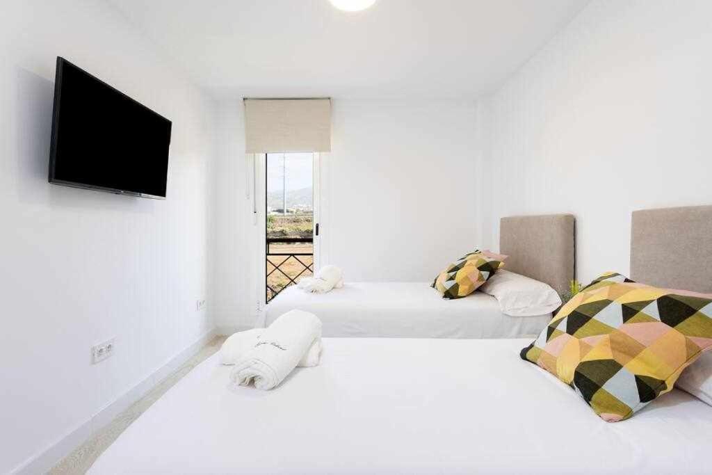 Sunnyland Apartment Arona Cho Esterno foto
